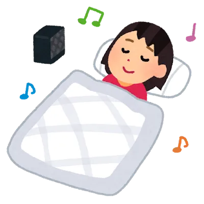 音楽を聴きながら眠りに就く女性